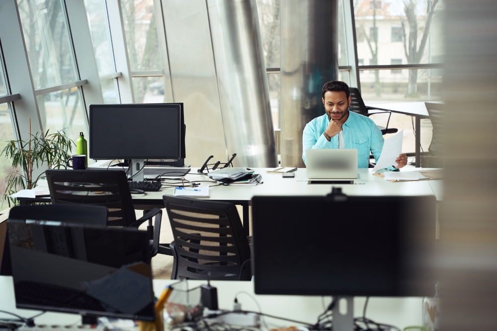 https://hubhouse.com.ng/wp-content/uploads/2025/04/man-looking-at-laptop-in-business-center-2024-10-20-22-26-52-utc.png